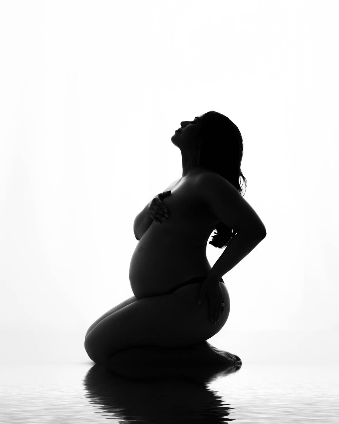 How To Pose Naturally For Maternity Photos In Dallas 3 Expecting Mother Posing During A Fine Art Maternity Portrait Session