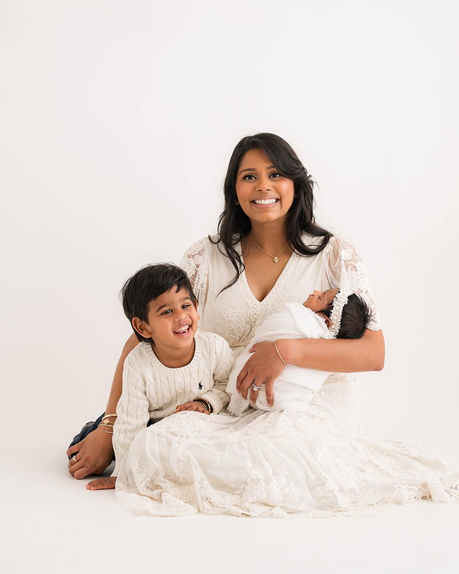 Coordinated Neutral Wardrobe Styling For Newborn Family Portraits