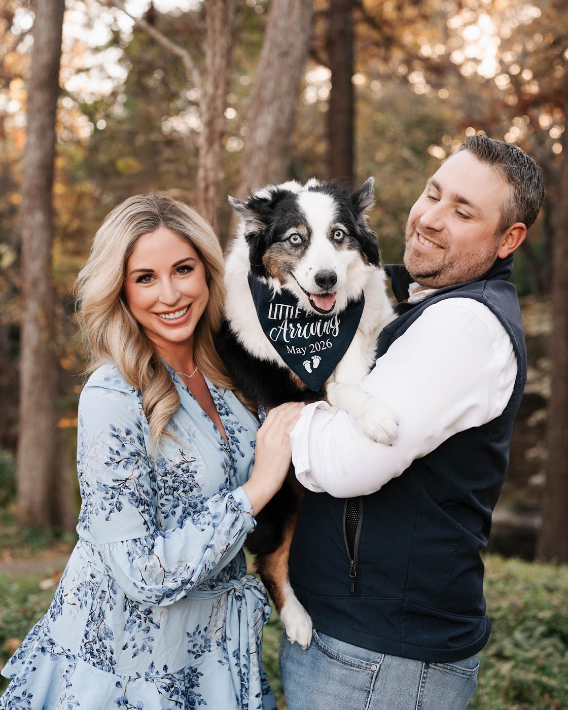 Couple Holding Their Dog During A Dallas Family Photography Session
