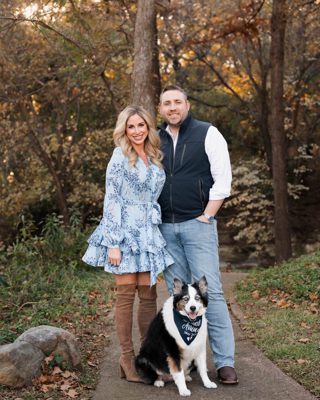 Family Standing With Their Dog During An Outdoor Family Portrait Session In The Dallas Area