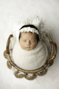 Infant Sleeping In A Basket For A Newborn Photoshoot With Dfw Newborn Photographer | Lily Hayes Photography