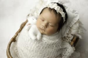 Newborn Baby Sleeping In A Basket Posed For Dfw Newborn Photographer | Lily Hayes Photography