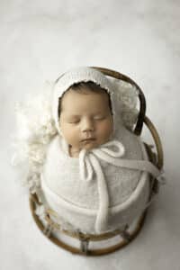 Newborn Wrapped In A White Blanket Posed For Dfw Newborn Photographer | Lily Hayes Photography