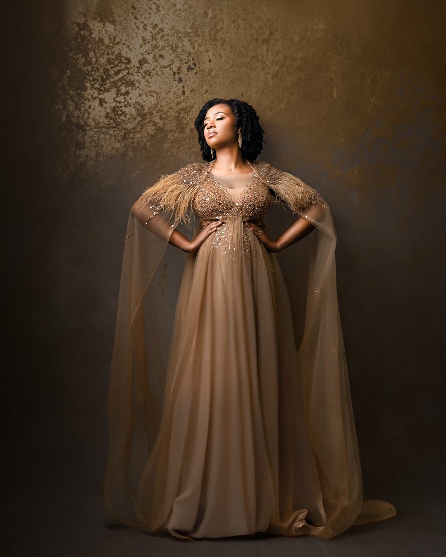 fine art maternity photography of woman posed in a elegant stance