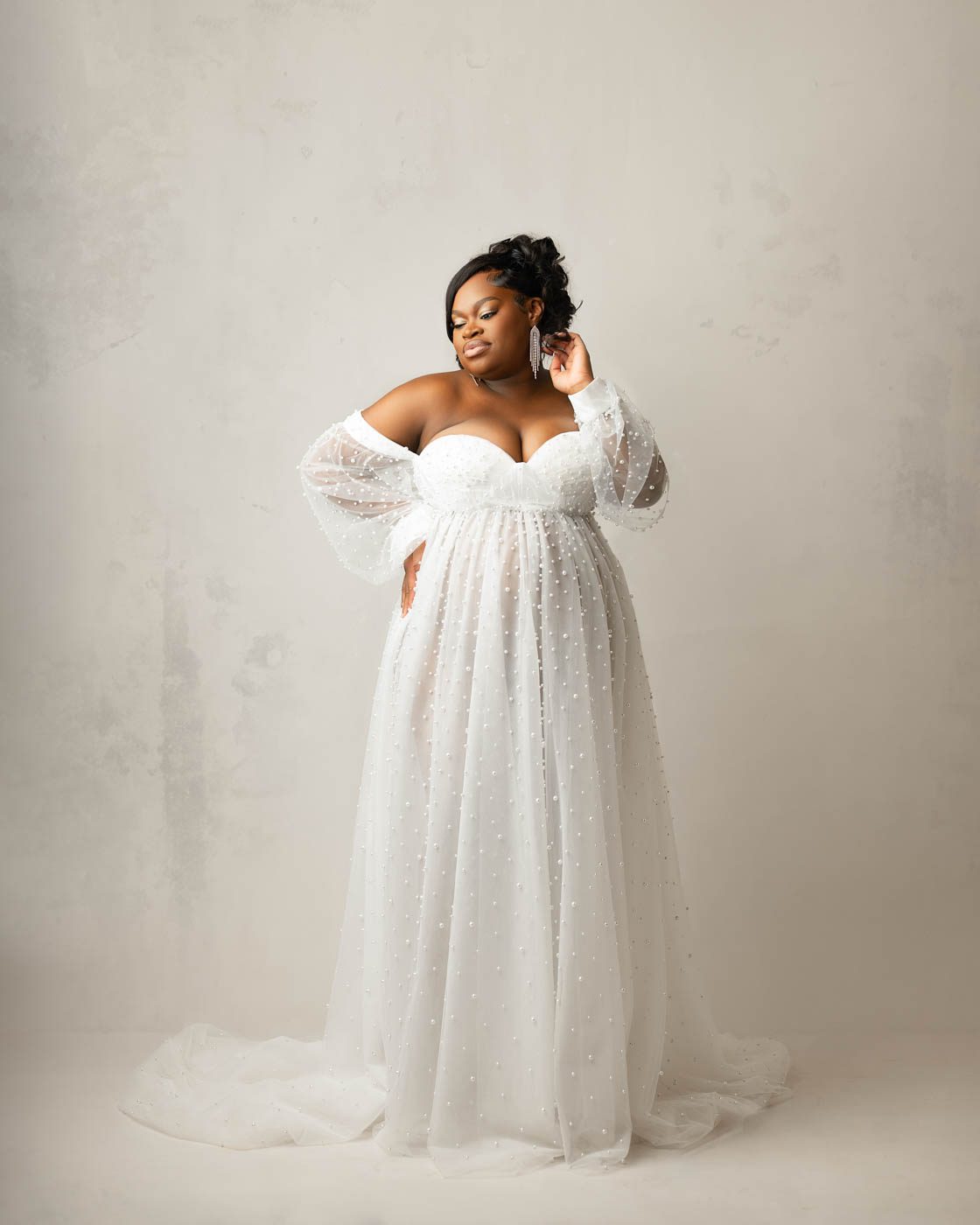 Celebrating Motherhood Through Maternity Portraits 2 Dallas Maternity Portrait Featuring An Expecting Mother In A Couture Maternity Gown.