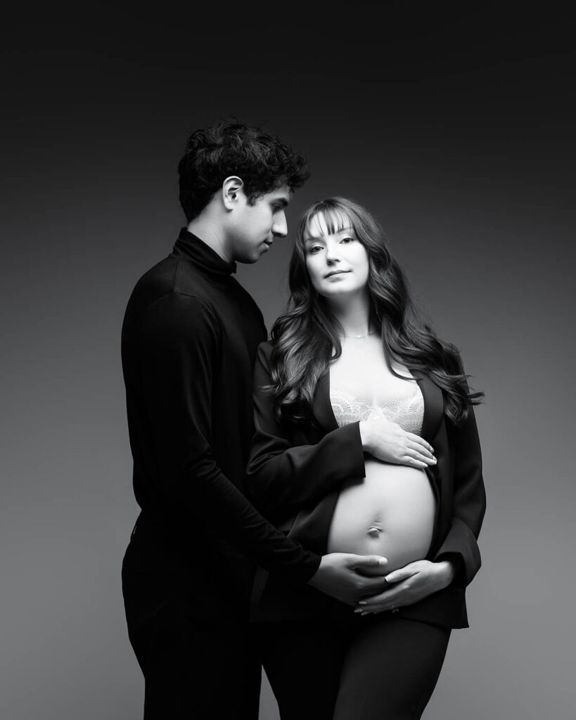 Dallas Maternity Photography Featuring Expecting Parents In A Standing Editorial Pose With Coordinated Clothing