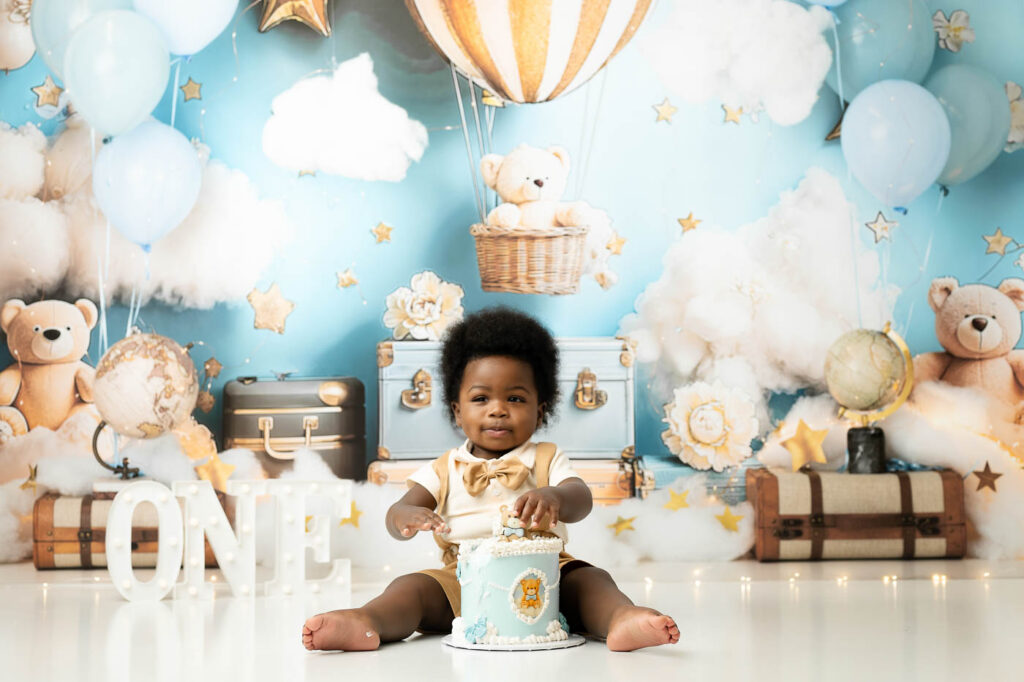 Baby Sitting During A Dallas Cake Smash Photography Session With A Hot Air Balloon Setup.